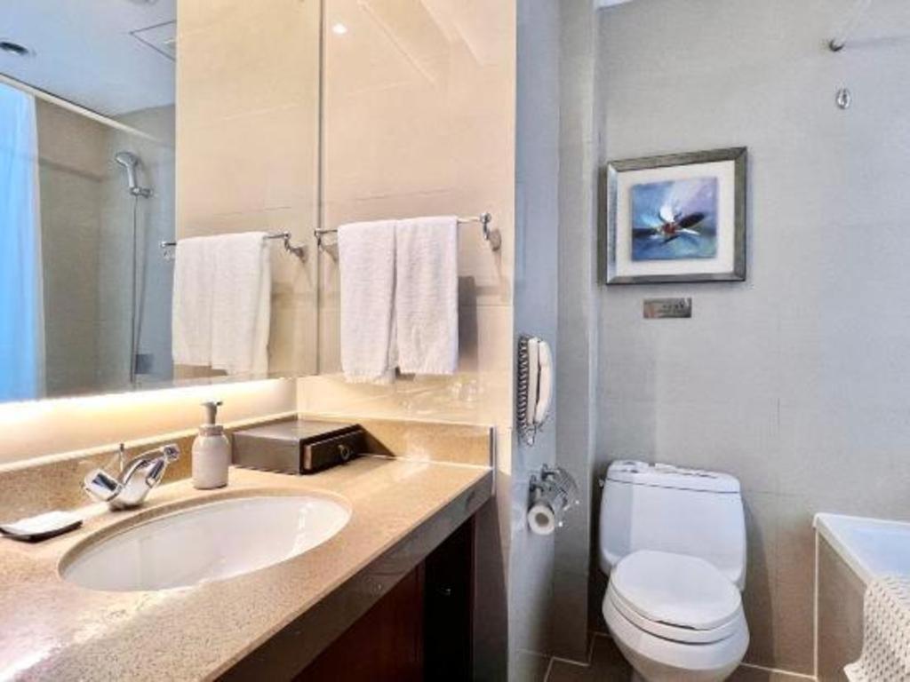 Qingdao Blue Horizon Hotel Licang Экстерьер фото