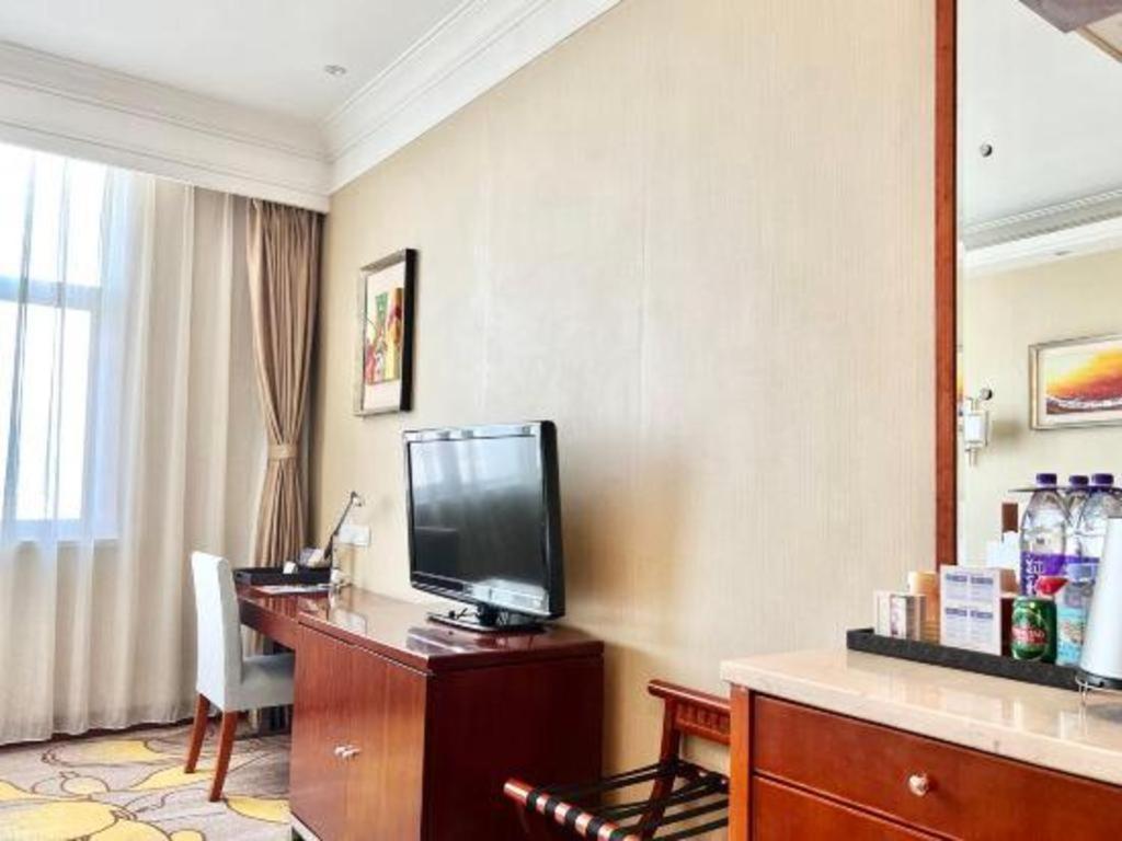 Qingdao Blue Horizon Hotel Licang Экстерьер фото